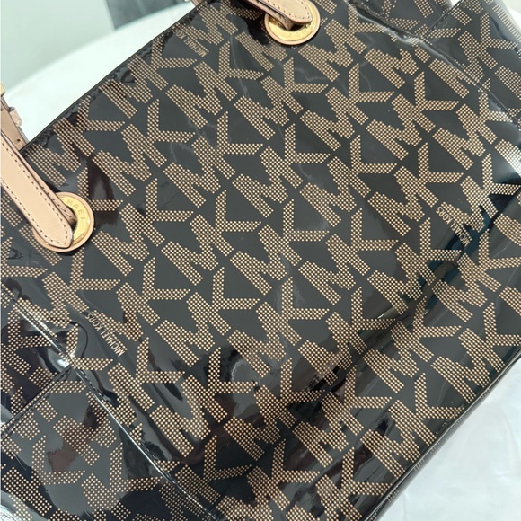 Michael Kors Black and Tan Signature Backpack - Picture 12 of 15